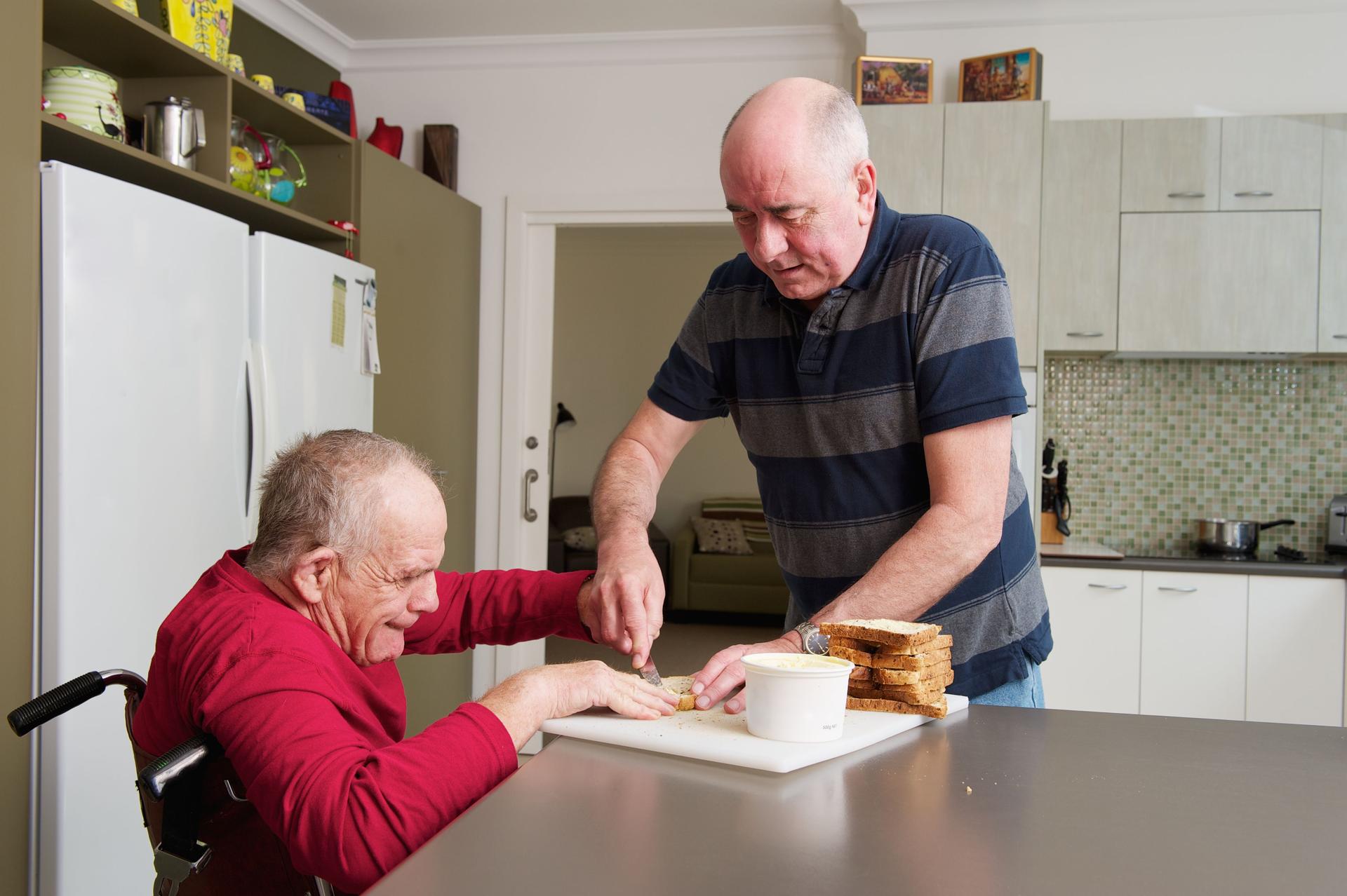 Home Carer assisting Man with a Disability